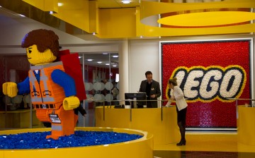 A Lego brick figurine of Emmet Brickowoski, a character from 'The Lego Movie', stands in the reception area at the headquarters of Lego A/S in Billund, Denmark, on Wednesday, Feb. 25, 2015.