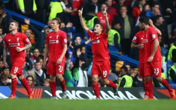 Liverpool winger Philippe Coutinho (#10) celebrates scoring his team's second goal against Chelsea.