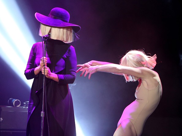 LOS ANGELES, CA - MAY 16: Musician Sia and dancer Denna Thomsen perform at An Evening with Women benefiting the Los Angeles LGBT Center at the Hollywood Palladium on May 16, 2015 in Los Angeles, California. (Photo by Jonathan Leibson/Getty Images for LOS ANGELES LGBT CENTER)