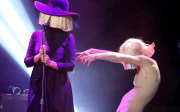 Musician Sia and dancer Denna Thomsen perform at An Evening with Women benefiting the Los Angeles LGBT Center at the Hollywood Palladium on May 16, 2015 in Los Angeles, California.
