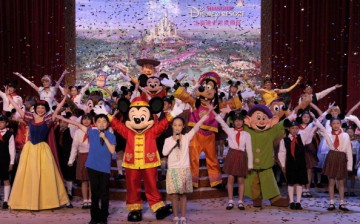 Mickey Mouse joins other Disney characters and a children's choir during the official groundbreaking ceremony for the Shanghai Disney Resort in Shanghai, China, April 8, 2011. 