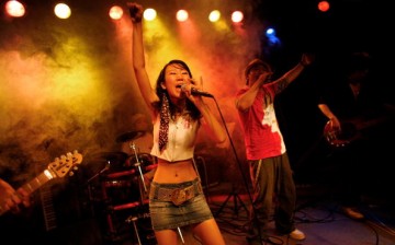 A band performs in a club at Beijing's Sanlitun night club district in Beijing, China, on Aug. 14, 2008.