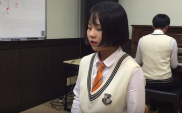 A teenage girl from Seoul, South Korea, performs Adele's 