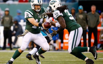 New York Jets quarterback Ryan Fitzpatrick hands off the football to running back Chris Ivory during their recent game against the Jacksonville Jaguars.