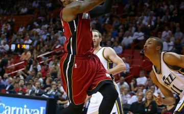 Former Miami Heat point guard Mario Chalmers goes for a layup against the Utah Jazz in this file photo.