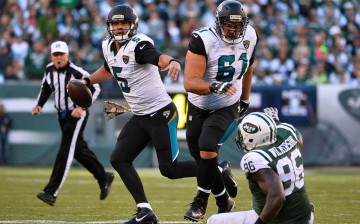 Jacksonville Jaguars quarterback Blake Bortles (#5) scrambles out of the pocket against the New York Jets.