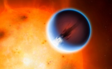 The planet HD 189733b is shown here in front of its parent star. A belt of wind around the equator of the planet travels at 5400mph from the heated day side to the night side. The day side of the planet appears blue due to scattering of light from silicat