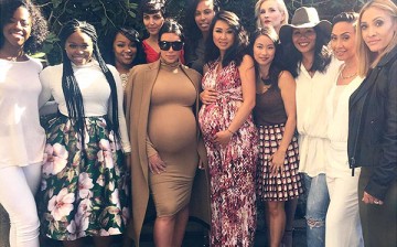 Kim Kardashian (third from left) has admitedly gained excessive weight during her second pregnancy.