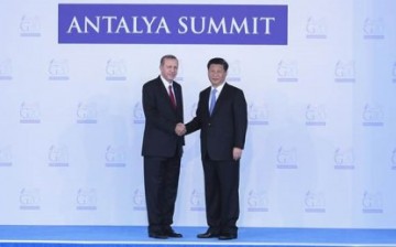 President Xi Jinping is welcomed by Turkey President Recep Tayyip Erdoğan during the G20 Summit in Antalya, southwest Turkey.