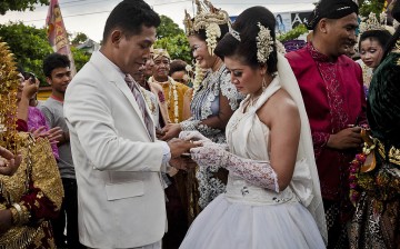 According to documents issued by the county's Party committee on Sunday, if both partners were previously married and divorced, they are not allowed to host a wedding party. 