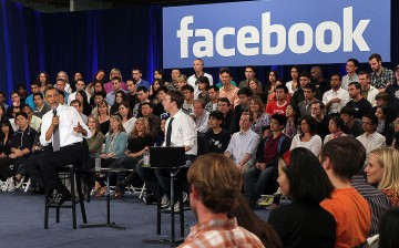 Facebook CEO Mark Zuckerberg is seen with President Barack Obama, who is speaking on the state of economy at a town hall style meeting organized at Facebook headquarters.