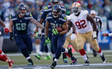 Seattle Seahawks running back Thomas Rawls (#34).