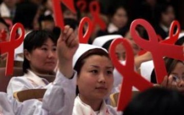 Chinese medical staff and personnel join an HIV/AIDS awareness campaign.