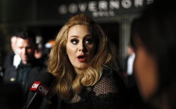 British singer Adele is interviewed at the Governors Ball following the 85th Academy Awards in Hollywood