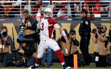Arizona Cardinals quarterback Carson Palmer scores a late touchdown against the San Francisco 49ers.