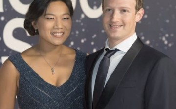 Facebook CEO Mark Zuckerberg poses with wife Priscilla Chan.