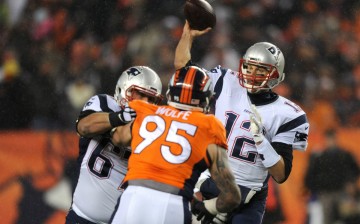 New England Patriots quarterback Tom Brady (#12).