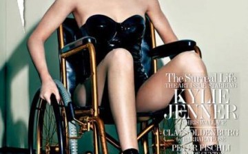 Kylie Jenner is slammed for posing in wheelchair.
