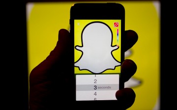 The Snapchat Inc. application (app) is displayed for a photograph on an Apple Inc. iPhone 5s in Washington, D.C., U.S., on Wednesday, Feb. 18, 2015. 