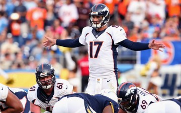 Denver Broncos quarterback Brock Osweiller (#17) call signals against the San Diego Chargers.