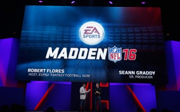 ESPN journalist Robert Flores (L) and Senior Producer Seann Graddy (R) introduce 'Madden NFL 16' during the Electronic Arts E3 press conference at the LA Sports Arena on June 15, 2015 in Los Angeles, California. 