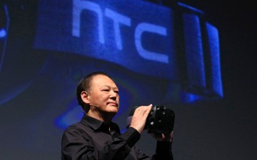 Peter Chou, chief executive officer of HTC Corp., unveils the View-A-Day virtual reality (VR) headset during a news conference ahead of the Mobile World Congress 2015 in Barcelona, Spain, on Sunday, Mar., 1, 2015. 