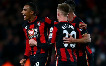 Bournemouth's Matt Ritchie, Junior Stanislas and Andrew Surman celebrate after the final whistle against Manchester United.