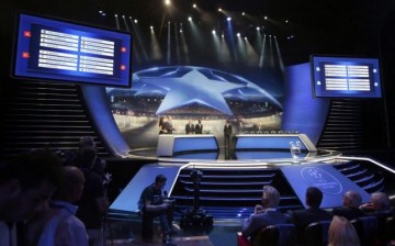 A general view of the screens shows the draw for the 2015/2016 UEFA Champions League Cup soccer competition at Monaco's Grimaldi Forum in Monte Carlo 