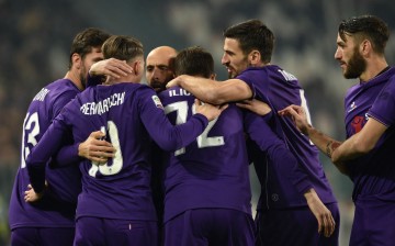 Fiorentina players celebrate Josip Ilicic's opening goal against Juventus.