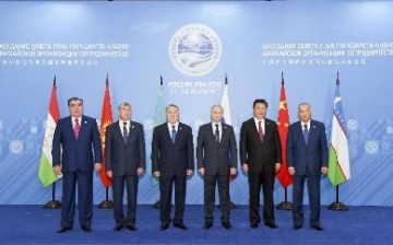 President Xi Jinping poses for a picture with other members of the Shanghai Cooperation Organization (SCO) in July 2015.