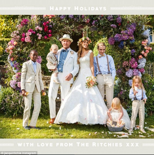 Jacqui Ainsley posted her July wedding photo showing Rocco Ritchie beside her smiling. 