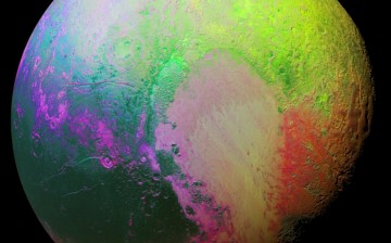 A false color image of the planet Pluto uses a technique called principal component analysis to highlight the color differences between Pluto's distinct regions.