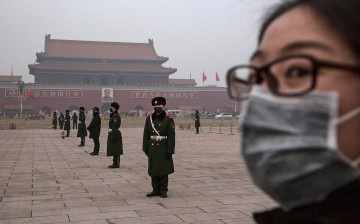 Chinese paramilitary police officers wear masks to protect themselves against pollution.