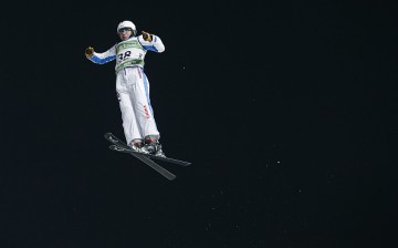 A competitive skier performs a jump at the Beijing National Stadium in Beijing, China, on Dec. 20, 2015.