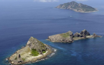 China has been warned by Japan not to intrude near the disputed Senkaku Islands.