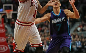 Charlotte Hornets point guard Jeremy Lin defends against Chicago Bulls' Derrick Rose.