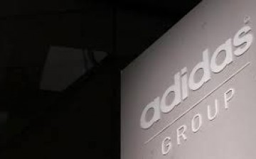 The logo of Adidas, the world's second largest sportswear firm, is pictured during the company's annual general meeting in the northern Bavarian town of Fuerth near Nuremberg, Germany, May 7, 2015.