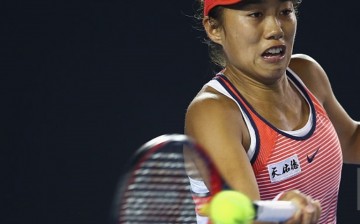 Shuai Zhang of China plays a forehand in her fourth round match against Madison Keys of the United States during day eight of the 2016 Australian Open in Melbourne, Australia.