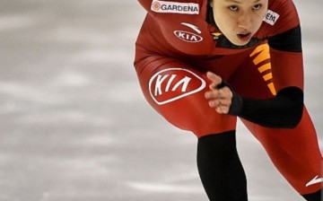 Hong Zhang of China competes in the Women's 1,000m race on day three of the ISU World Cup Speed Skating Salt Lake City Event at the Utah Olympic Oval in Kearns, Utah, on Nov. 22, 2015. 