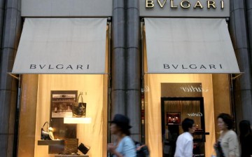  People walk by a Bulgari boutique in the Ginza district of Tokyo, Japan, on July 10, 2009.