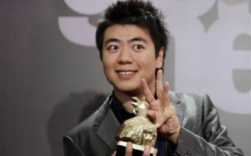 Chinese pianist Lang Lang holds his ''Goldene Henne'' (Golden Hen) award in the category ''Classical Music'' after the award ceremony at the Friedrichstadtpalast in Berlin, Sept. 15, 2010.