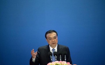 Chinese Premier Li Keqiang speaks during the Inaugural Meeting of the Board of Governors of the Asian Infrastructure Investment Bank (AIIB) in Beijing, China, Jan. 16, 2016. 