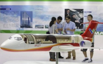 A model of the ARJ21 regional jet from Commercial Aircraft Corp. of China (COMAC) is displayed at the Aviation Expo China 2015 in Beijing, China, Sept. 16, 2015.