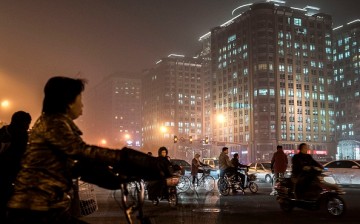 Beijing encourages its residents to use low-emission public transport such as bicycles.