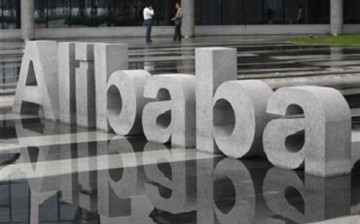 An analyst has called on Alibaba to make large overseas acquisitions if it were to maintain itself as an emerging global brand.