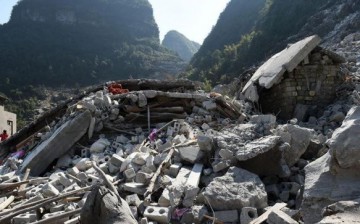 A screencap showing the site of a landslide at Fude Village in Du'an Yao Autonomous County, Guangxi Zhuang Autonomous Region, on Feb. 8, 2016.