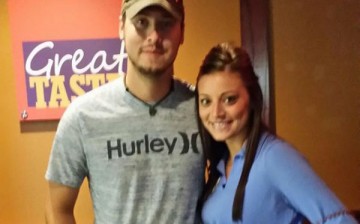 Jeremy Calvert and Brooke Wehr pose for a photo during a dinner date.