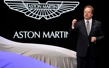 Aston Martin CEO Andy Palmer speaks during the 85th International Motor Show in Geneva, Switzerland, on March 3, 2015.