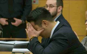 Former police officer Peter Liang reacts as the court reads the guilty verdict of the jury.