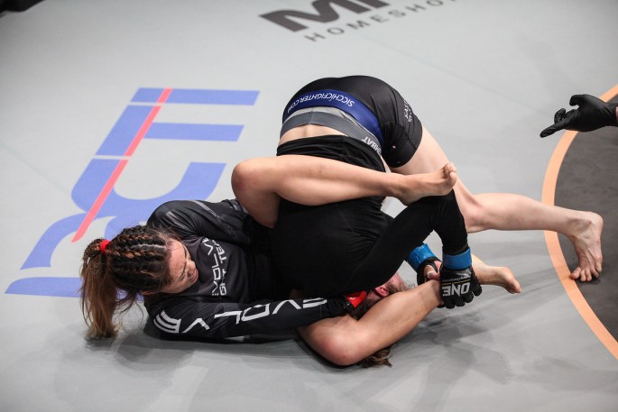 Angela Lee executing a Peruvian Necktie, one of her many unique and rare grappling moves